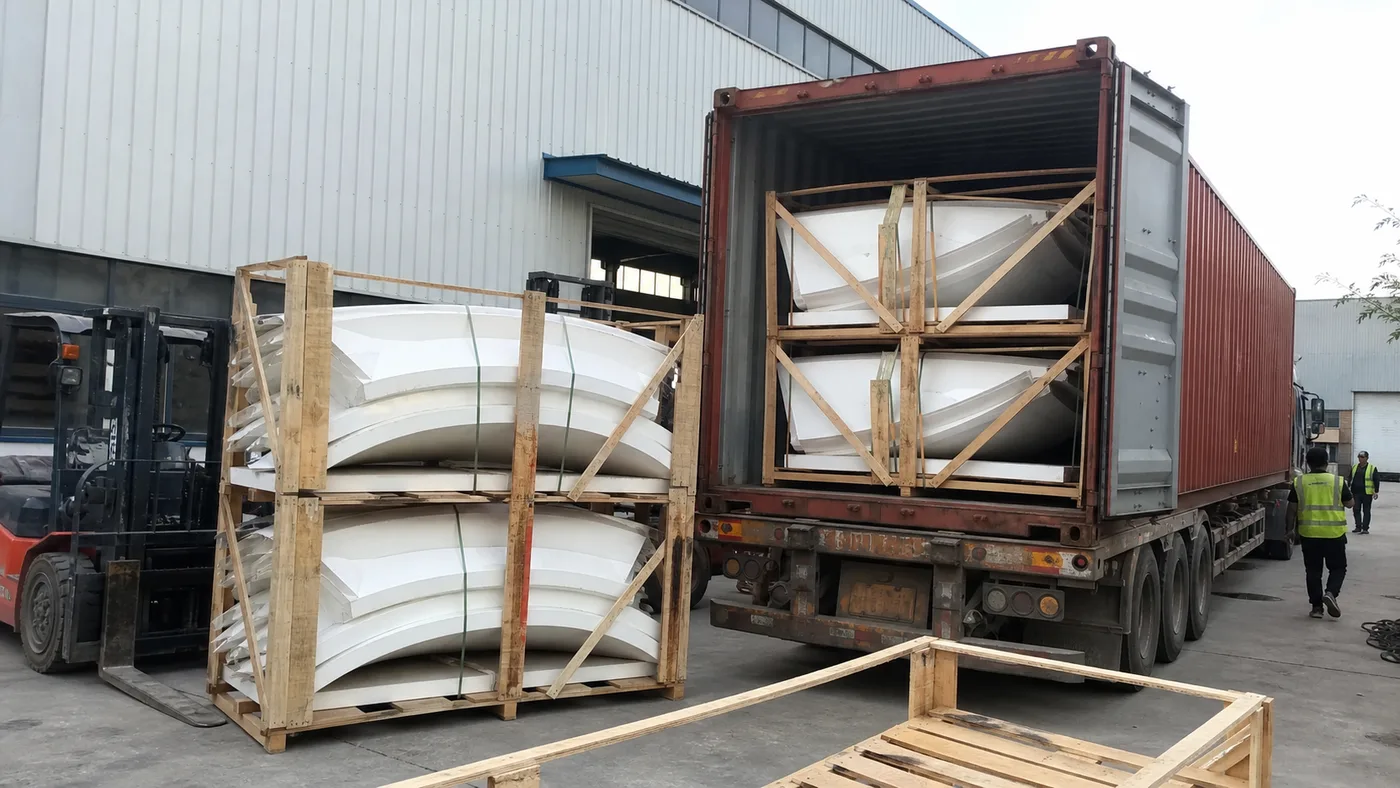 Reference visual of EPS dome modules prepared in export frames beside a 40-foot high-cube container